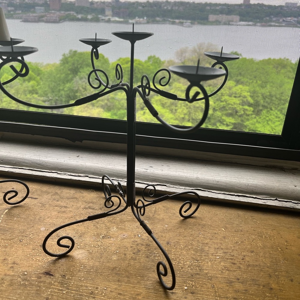 2 scrolled metal candlesticks